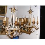 A pair of decorative metal ceiling lights