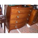 A mahogany bow fronted chest of four long graduate