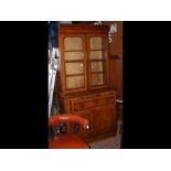 A Victorian mahogany secretaire bookcase with glaz