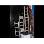 A 22 rung aluminum extending ladder, together with