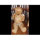 An old straw filled Teddy Bear - 60cm tall