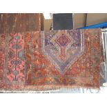 Three Middle Eastern rugs