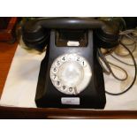 A vintage black Bakelite telephone