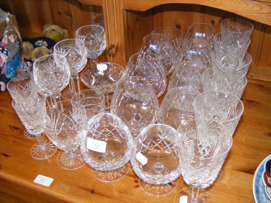 Various cut glass brandy balloons and other drinki