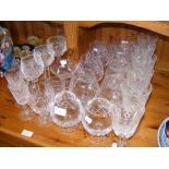 Various cut glass brandy balloons and other drinki