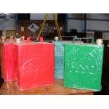 Four vintage petrol cans including Esso