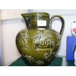 An Arthur Wood green glazed six pint jug