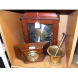 An oak cased mantel clock together with a battery