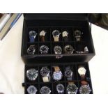 Twenty assorted military watches in case