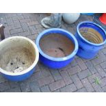 Three blue glazed plant pots