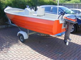 A 15ft fishing boat with trailer, 15HP Mariner outboard and radio, fish finder etc.