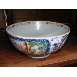 An antique Oriental bowl with hand painted panels