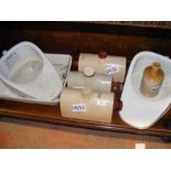 Two ceramic slipper pans, three stoneware water bo