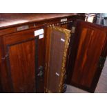 An interesting Victorian mahogany picture cabinet