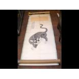 An oriental scroll depicting mythical cat