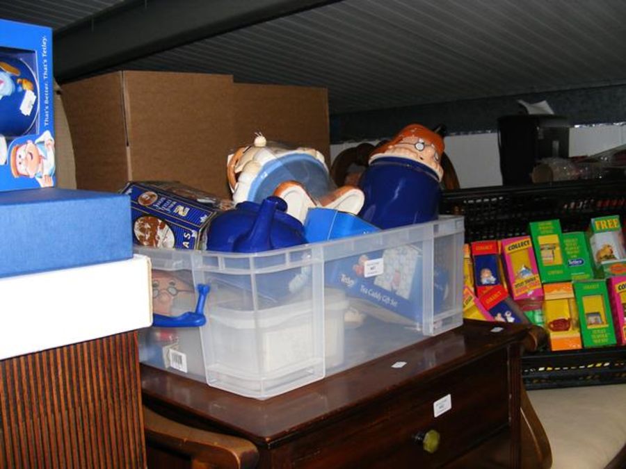 A collection of Tetley memorabilia, including boxe