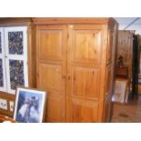 A two door panelled wardrobe