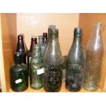 A selection of old isle of Wight beer bottles etc.