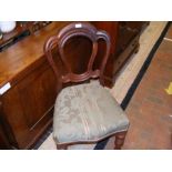 A set of four Victorian dining chairs