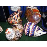 Four boxed Royal Crown Derby animal paperweights i