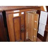 An interesting Victorian mahogany picture cabinet