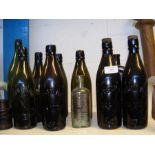 A collection of Isle of Wight bottles, including W