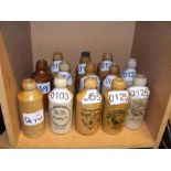 Thirteen vintage Isle of Wight stoneware bottles i