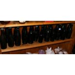 A collection of Isle of Wight glass bottles, inclu