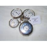 Three silver cased pocket watches, together with o
