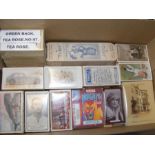 A box of vintage cigarette cards