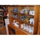 A Gibbs mid 20th century teak cabinet with glazed