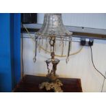 A silver plated table lamp with decorative glass s