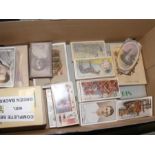 A box of vintage cigarette cards