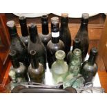 Assorted Isle of Wight glass bottles, including E