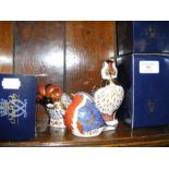 Three boxed Royal Crown Derby animal paperweights,