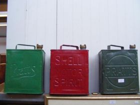 A vintage Shell petrol can together with two Pratt