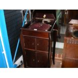 An Apollo cabinet gramophone with Apollo Junior ne