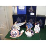 Five Royal Crown Derby paperweights, including 'Ro