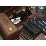 An Imperial typewriter together with a sewing mach