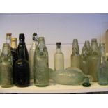 A collection of Isle of Wight bottles, including G