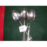 Two London hallmarked silver serving spoons and on
