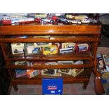 A collection of boxed and un-boxed die-cast model