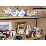 A collection of teapots and advertising ceramics -