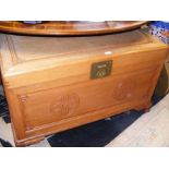 An oriental camphorwood chest with brass lock