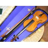 An old violin bearing label to interior 'Stradivarius copy',