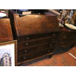 A Georgian mahogany fall front bureau with four dr