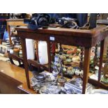 A birds-eye maple tray top occasional table