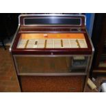 A vintage Wurlitzer jukebox fitted with several si