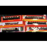 Six boxed Hornby coaches, all in Pullman style liv