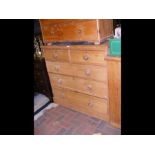 A pine chest of two short and three long drawers -